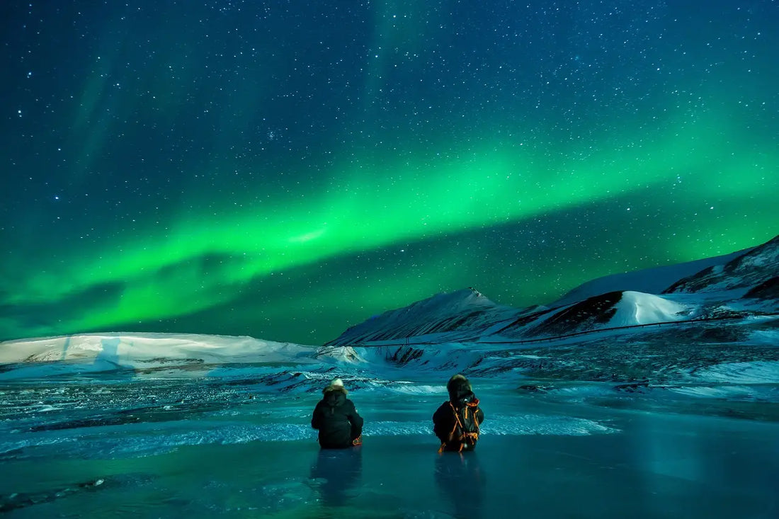 Cold plunge in scandinavia with a view of the northern lights