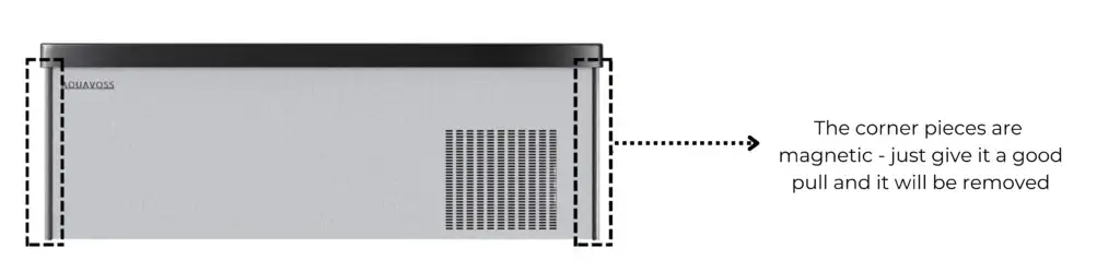 Remove the two black corner pieces by gently pulling them away from the unit.